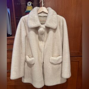 Faux fur coat creamy